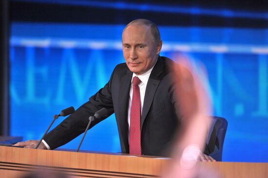 Vladimir Putin gives news conference