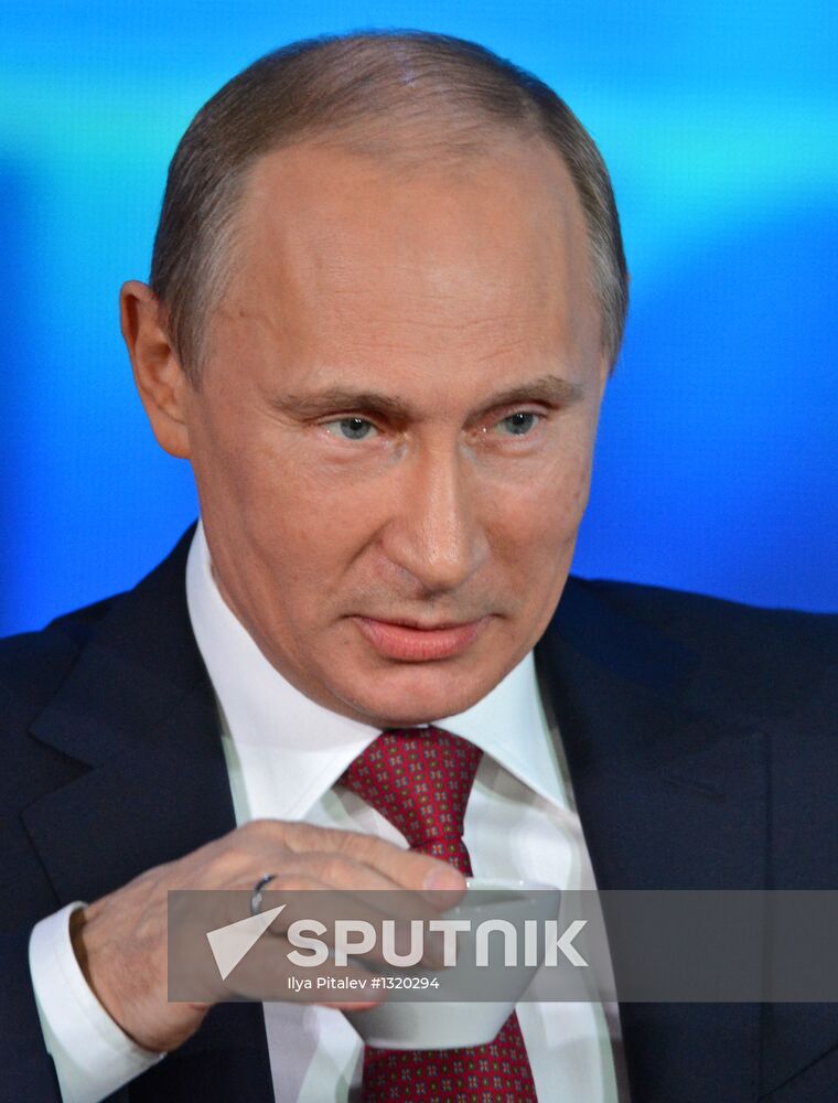 Vladimir Putin gives news conference