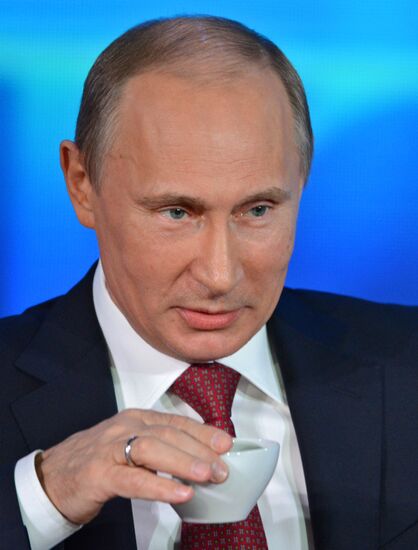 Vladimir Putin gives news conference