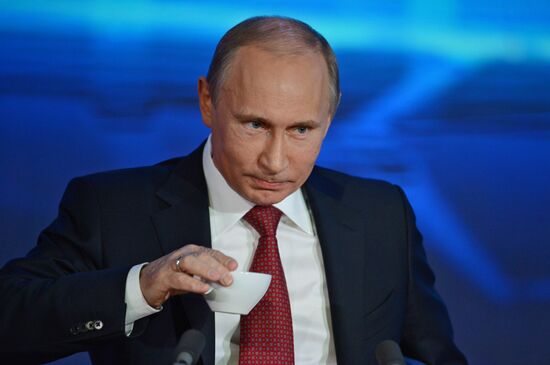 Vladimir Putin gives news conference