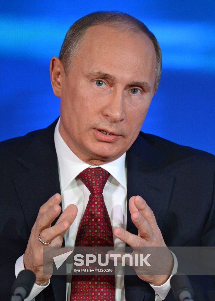 Vladimir Putin gives news conference