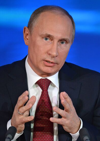 Vladimir Putin gives news conference