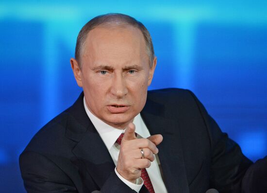 Vladimir Putin gives news conference