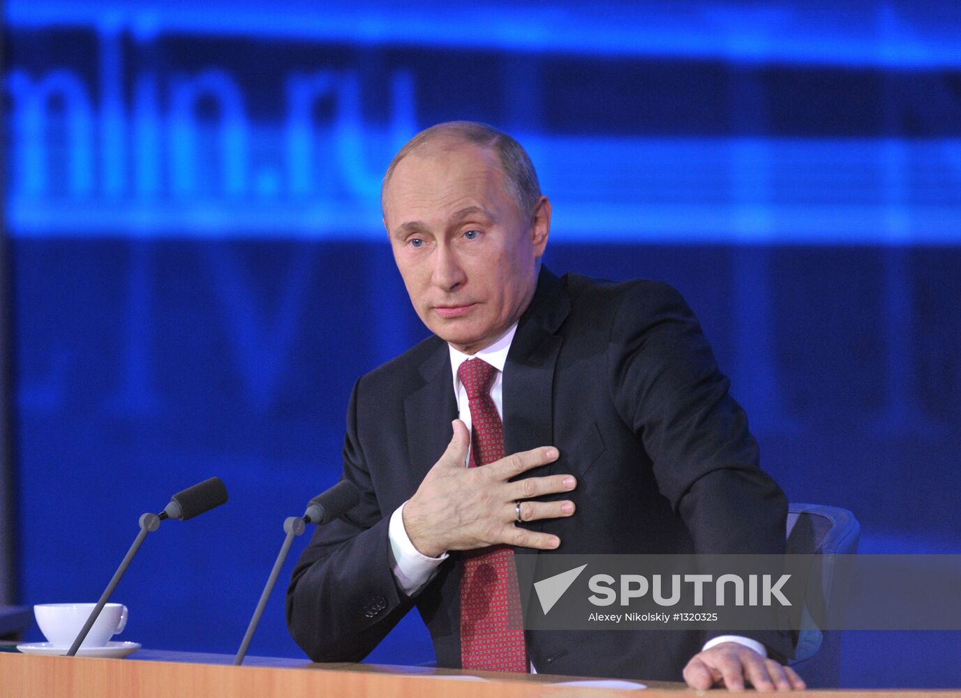 Vladimir Putin gives news conference