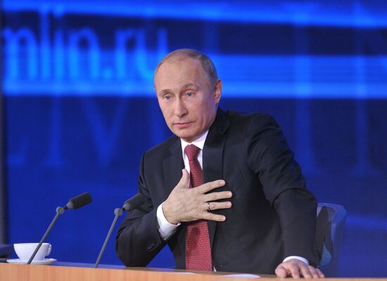Vladimir Putin gives news conference