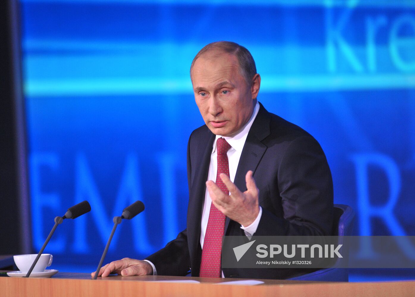 Vladimir Putin gives news conference