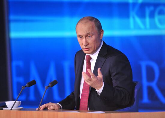 Vladimir Putin gives news conference