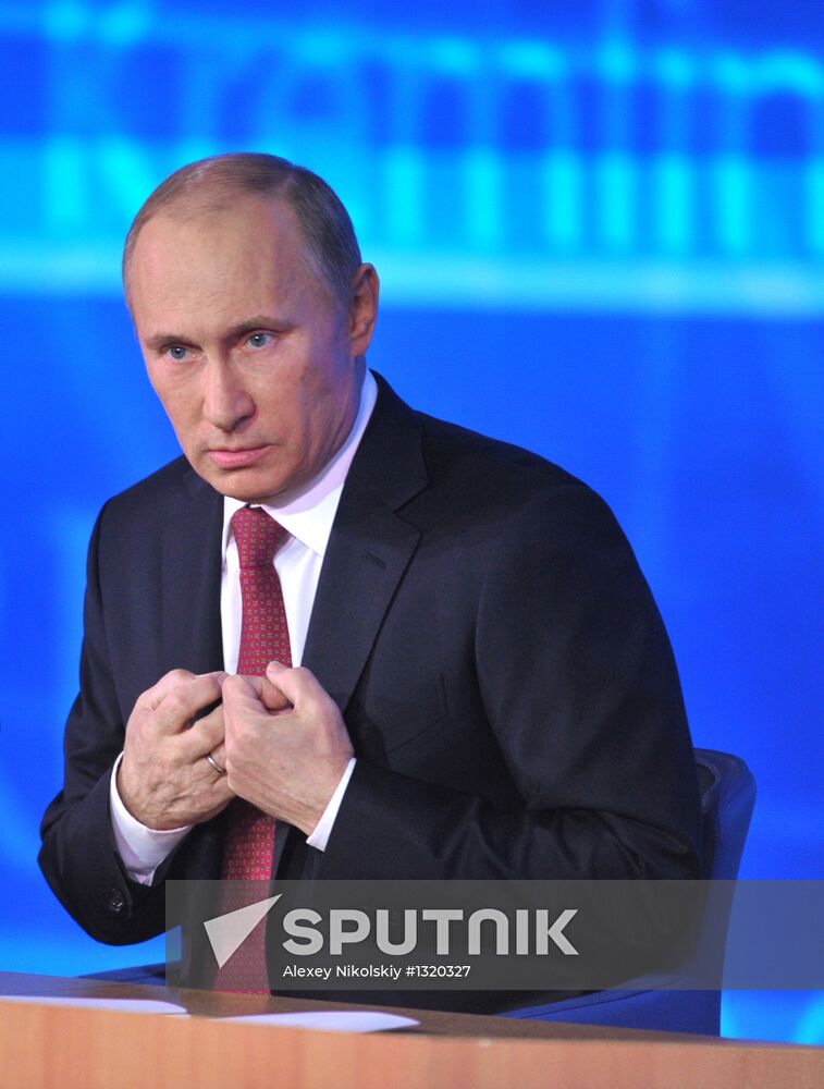 Vladimir Putin gives news conference