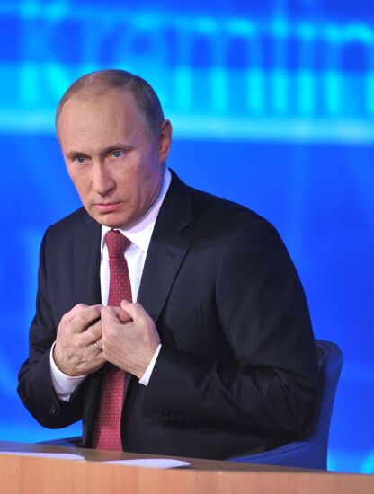 Vladimir Putin gives news conference