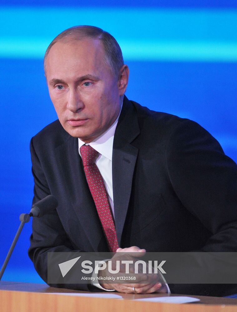 Vladimir Putin gives news conference