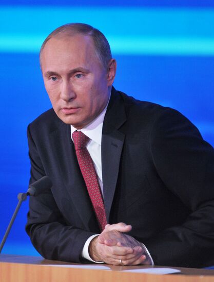 Vladimir Putin gives news conference