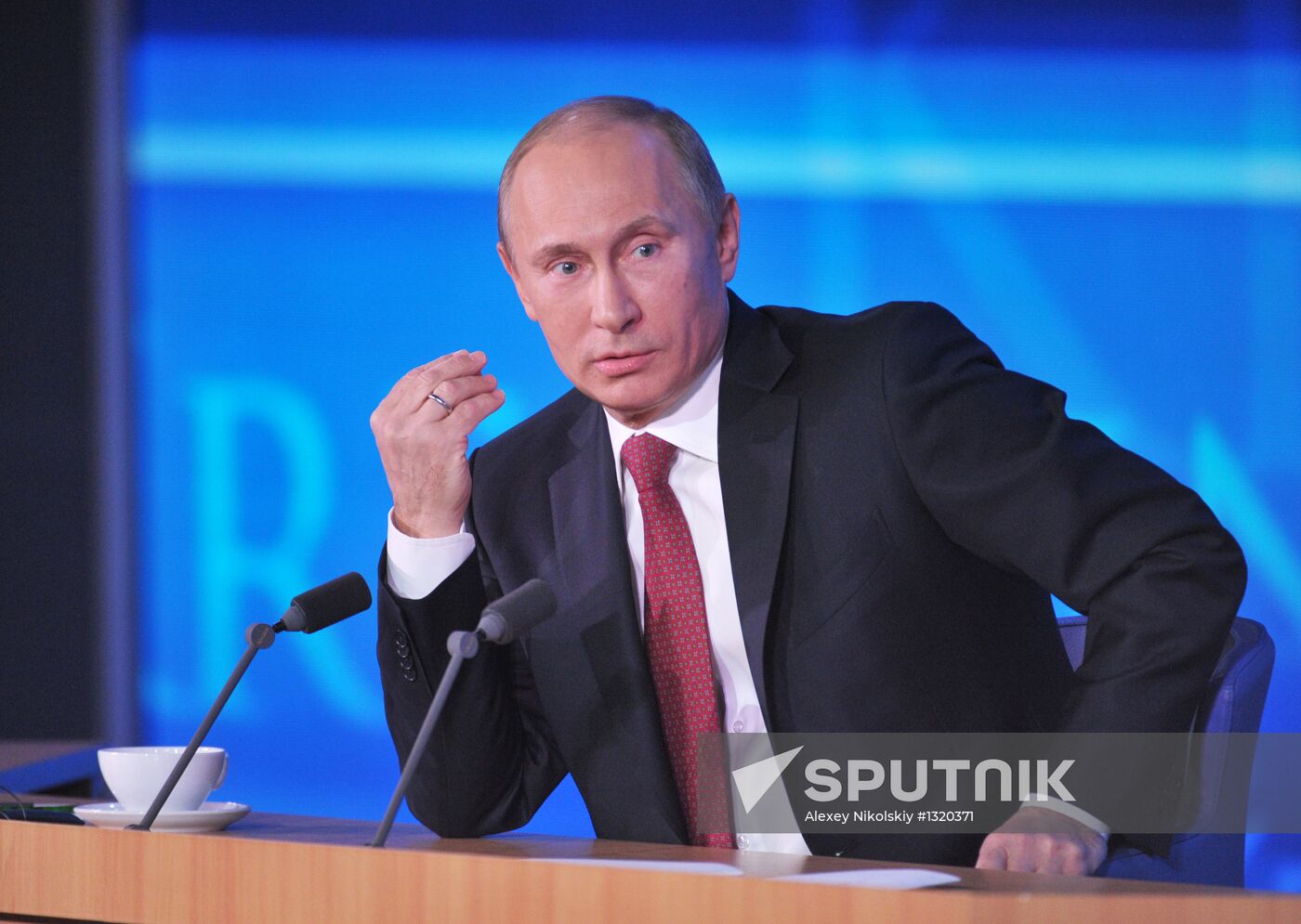 Vladimir Putin gives news conference