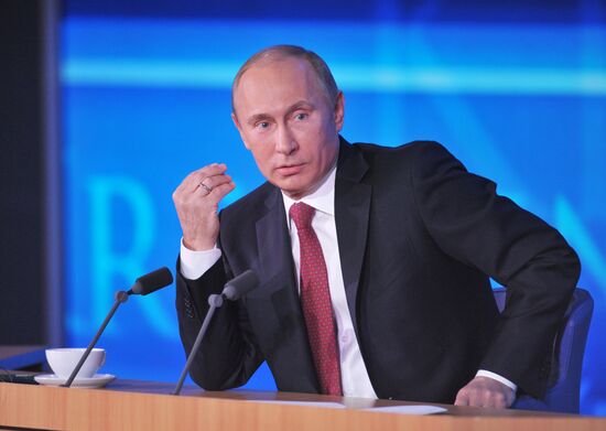 Vladimir Putin gives news conference