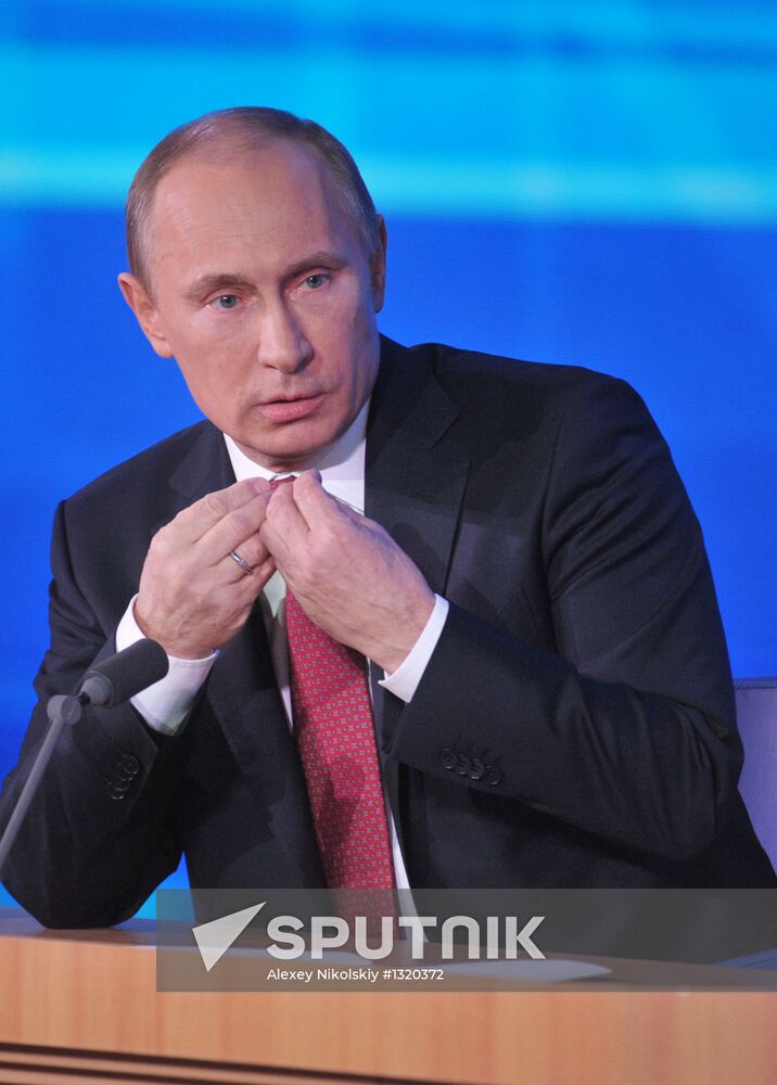 Vladimir Putin gives news conference