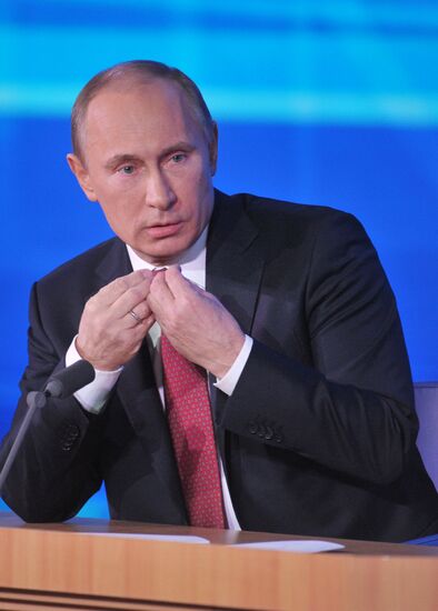 Vladimir Putin gives news conference