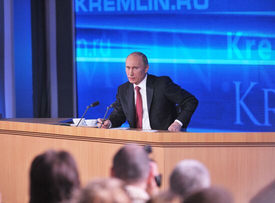 Vladimir Putin gives news conference