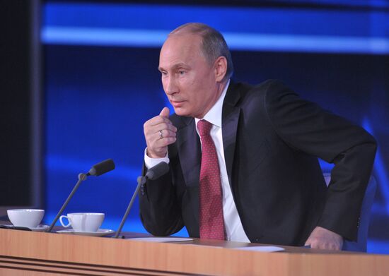 Vladimir Putin gives news conference