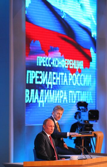 Vladimir Putin gives news conference