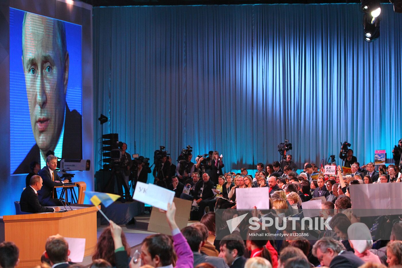 Vladimir Putin gives news conference