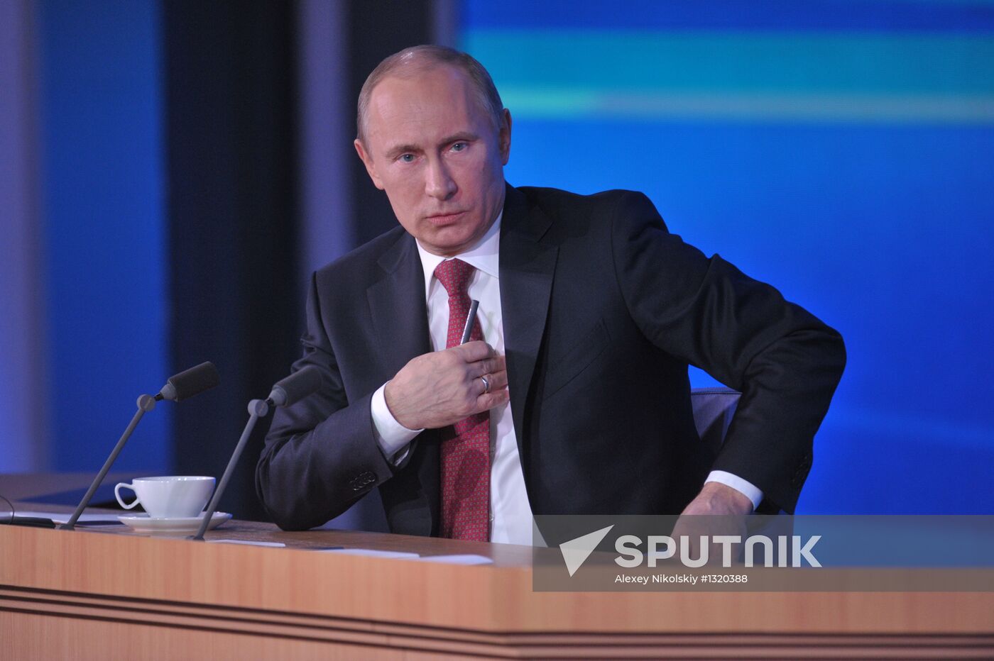 Vladimir Putin gives news conference