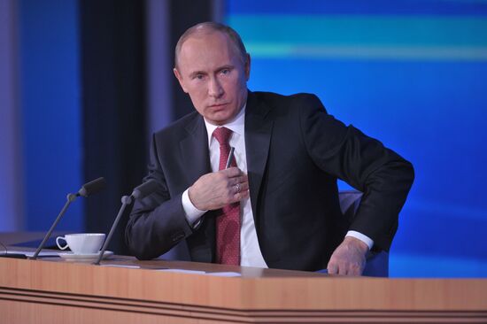 Vladimir Putin gives news conference