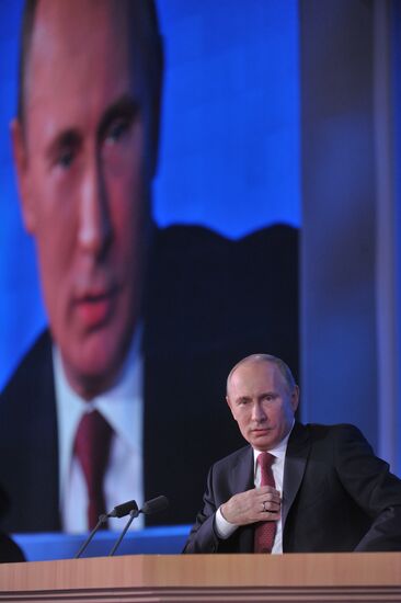 Vladimir Putin gives news conference