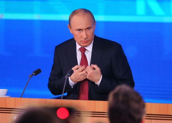 Vladimir Putin gives news conference