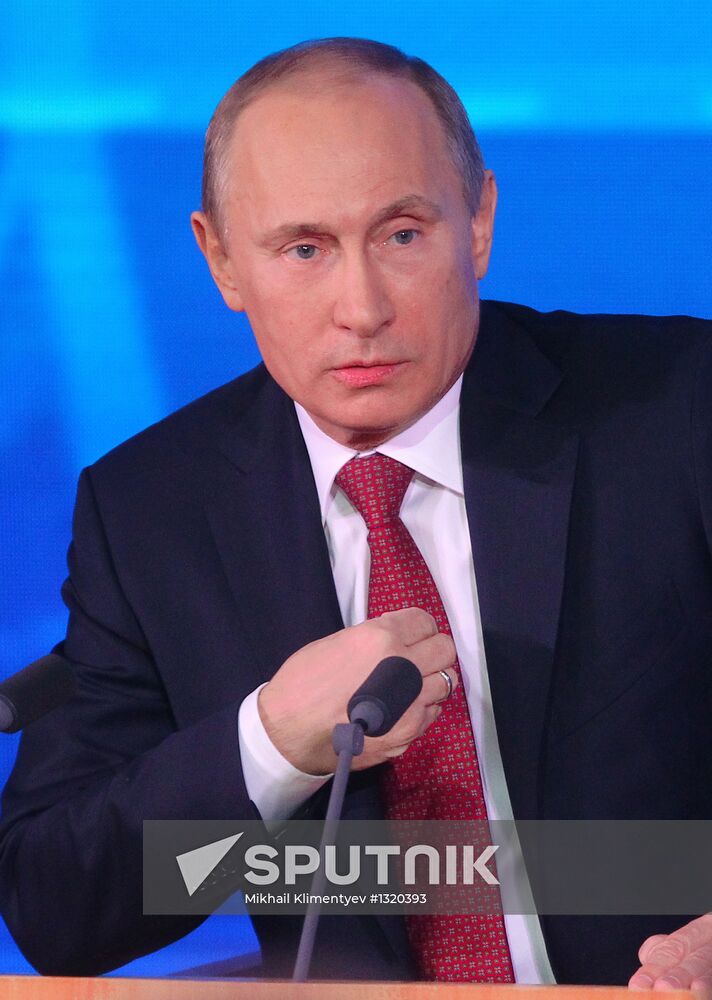 Vladimir Putin gives news conference