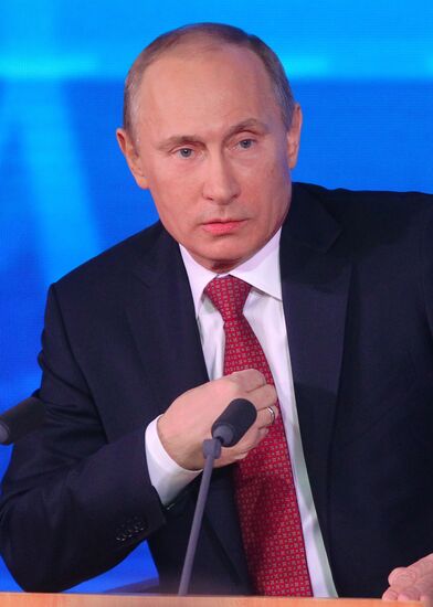 Vladimir Putin gives news conference