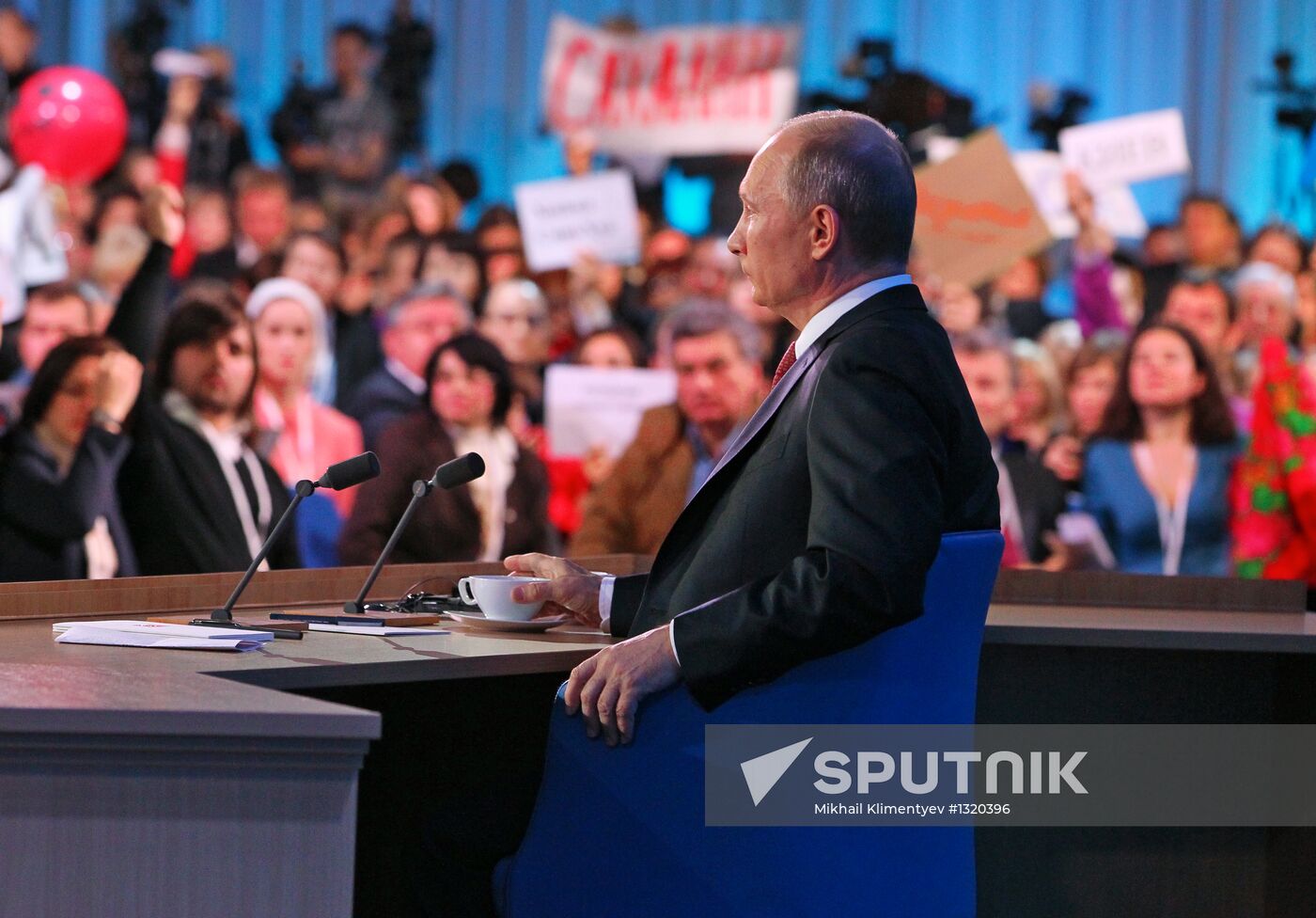 Vladimir Putin gives news conference
