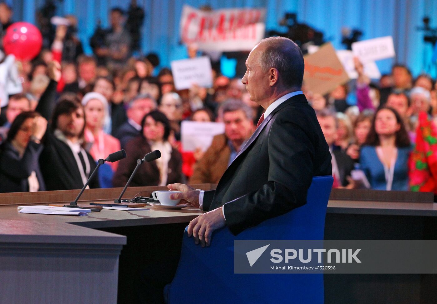 Vladimir Putin gives news conference