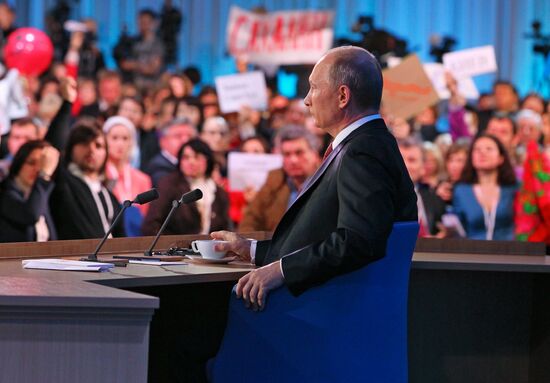 Vladimir Putin gives news conference