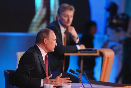 Vladimir Putin gives news conference
