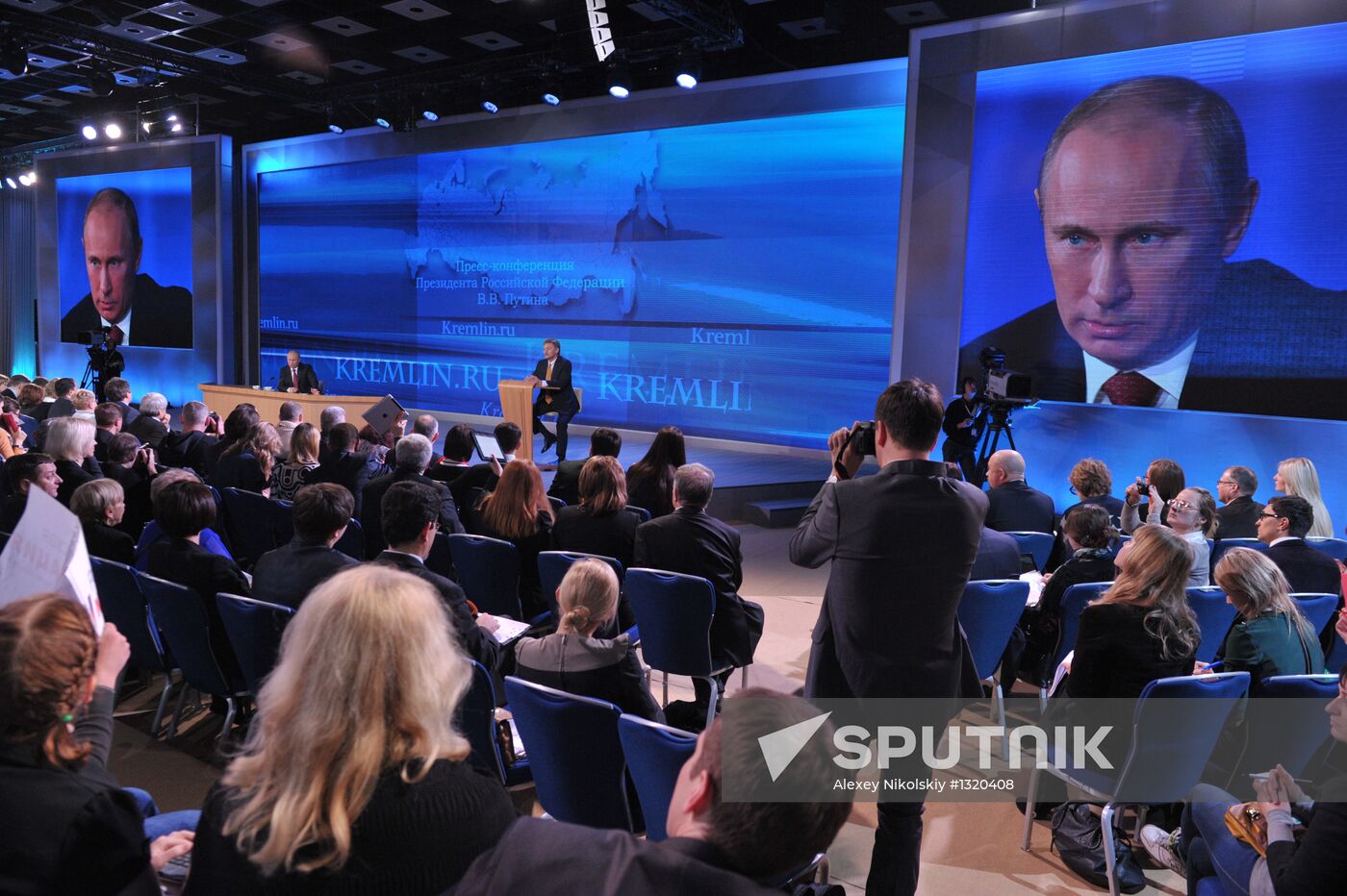 Vladimir Putin gives news conference