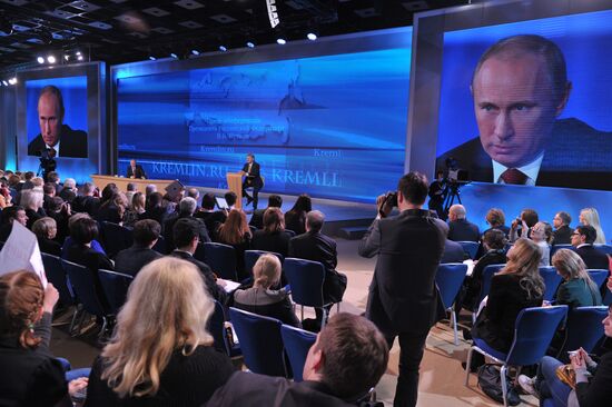 Vladimir Putin gives news conference