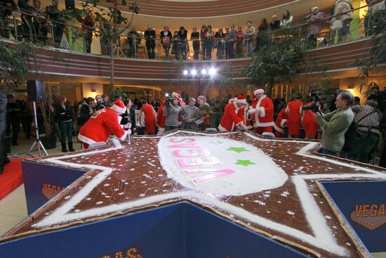 Making giant gingerbread in shape of Star of Bethlehem