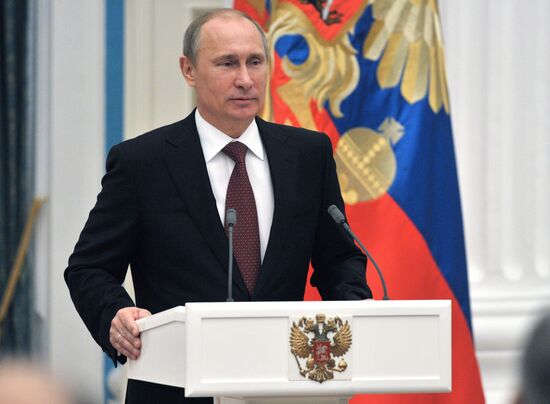 President Vladimir Putin presents state awards at the Kremlin