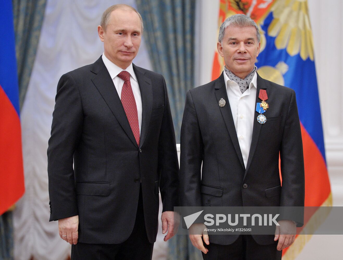 President Vladimir Putin presents state awards at the Kremlin