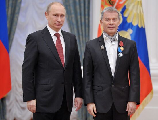 President Vladimir Putin presents state awards at the Kremlin