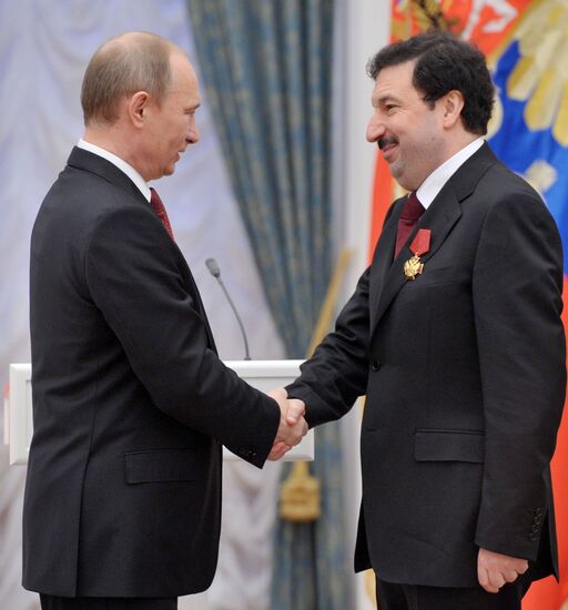President Vladimir Putin presents state awards at the Kremlin