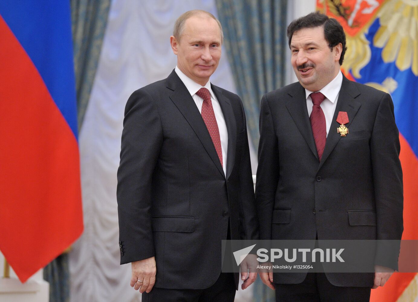 President Vladimir Putin presents state awards at the Kremlin