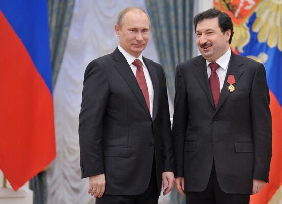 President Vladimir Putin presents state awards at the Kremlin
