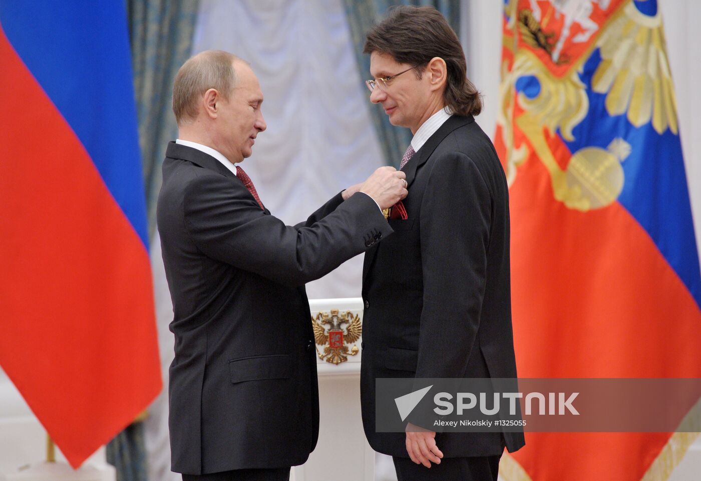 President Vladimir Putin presents state awards at the Kremlin