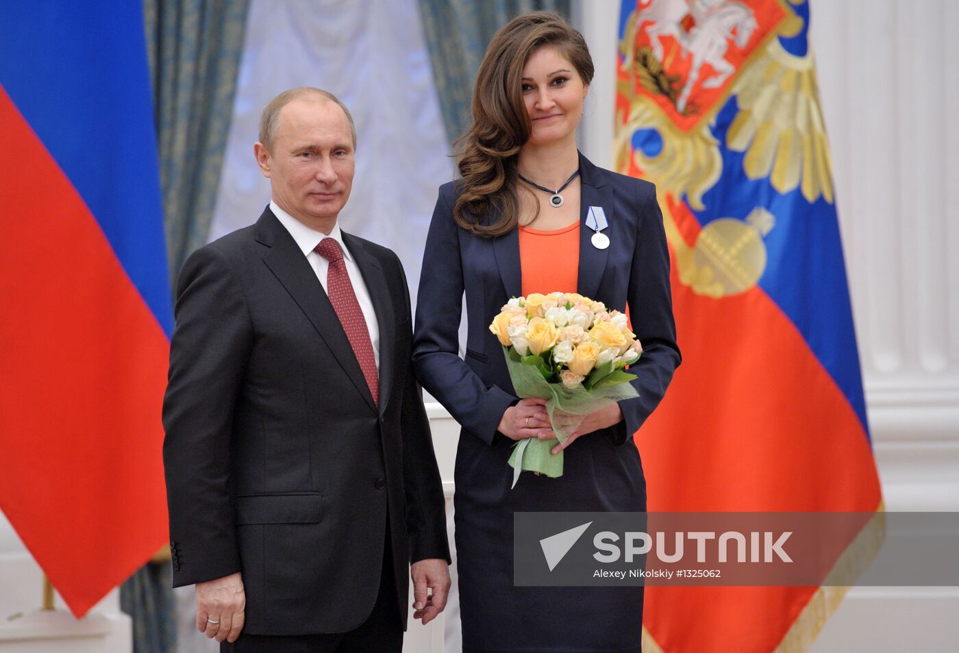 President Vladimir Putin presents state awards at the Kremlin