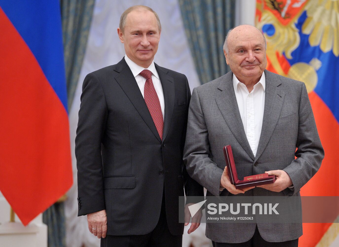 President Vladimir Putin presents state awards at the Kremlin