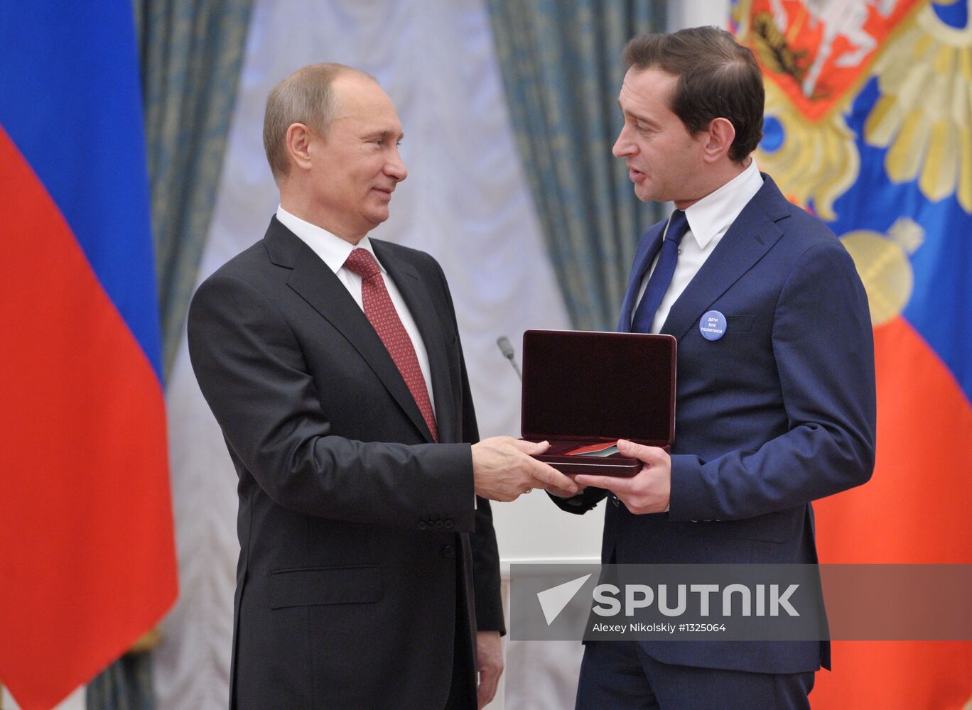 President Vladimir Putin presents state awards at the Kremlin