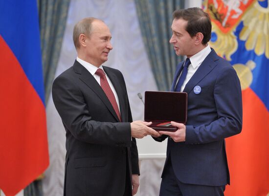 President Vladimir Putin presents state awards at the Kremlin