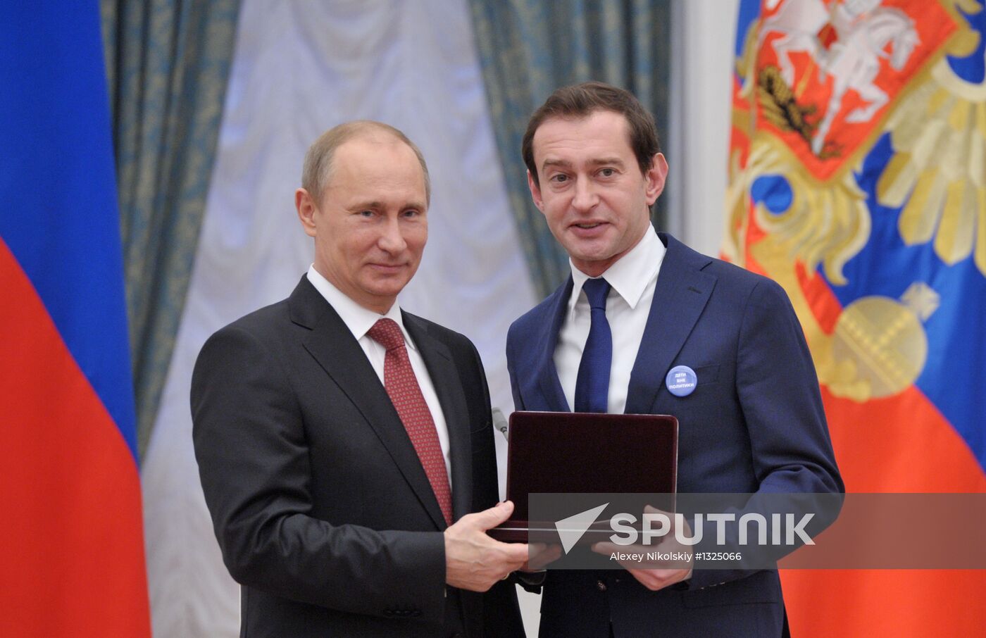 President Vladimir Putin presents state awards at the Kremlin