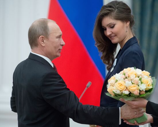President Vladimir Putin presents state awards at the Kremlin