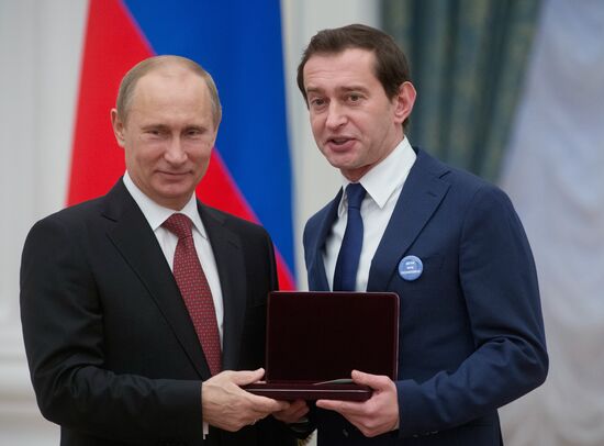 President Vladimir Putin presents state awards at the Kremlin